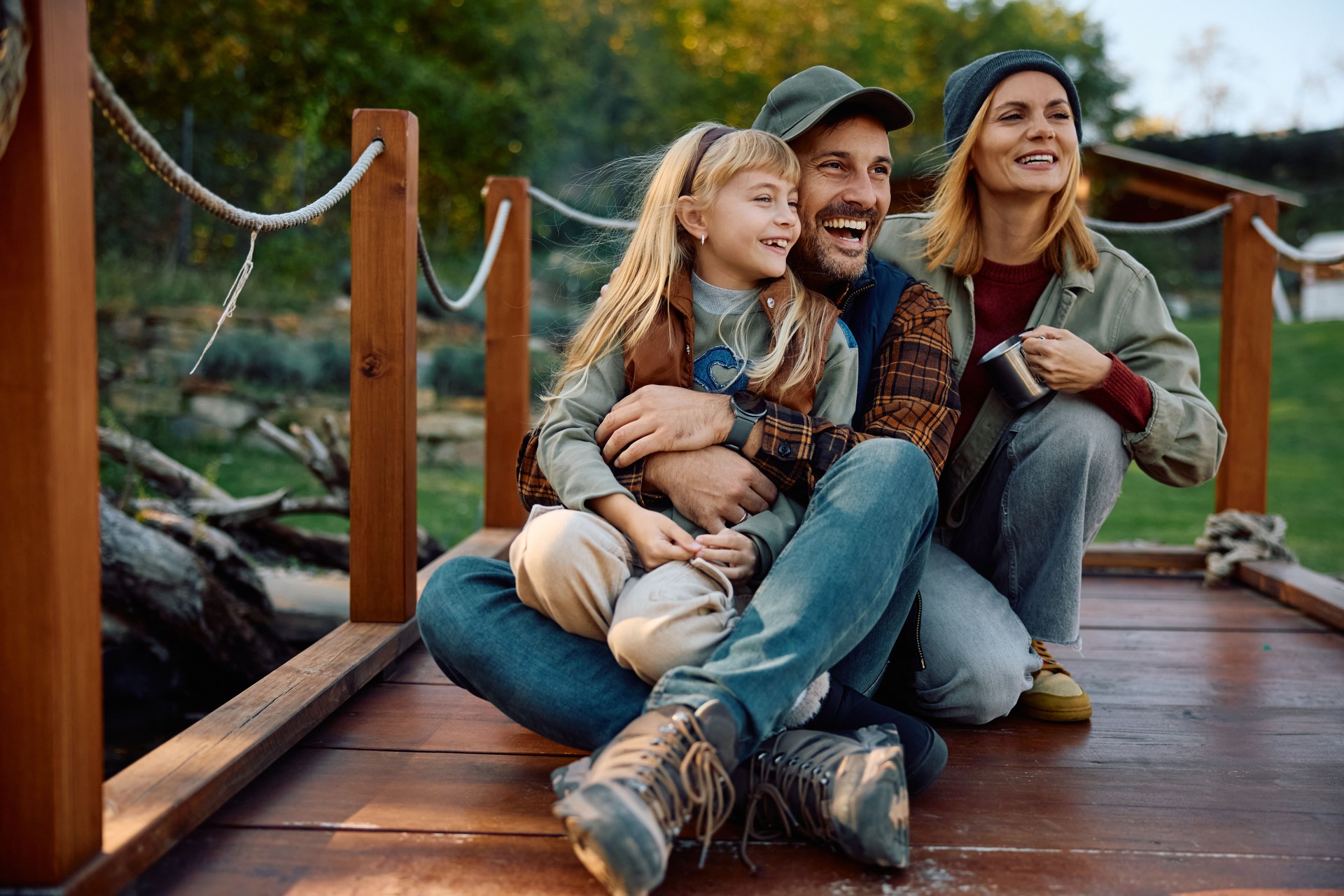 Carefree family enjoying in spending a weekend in nature.
